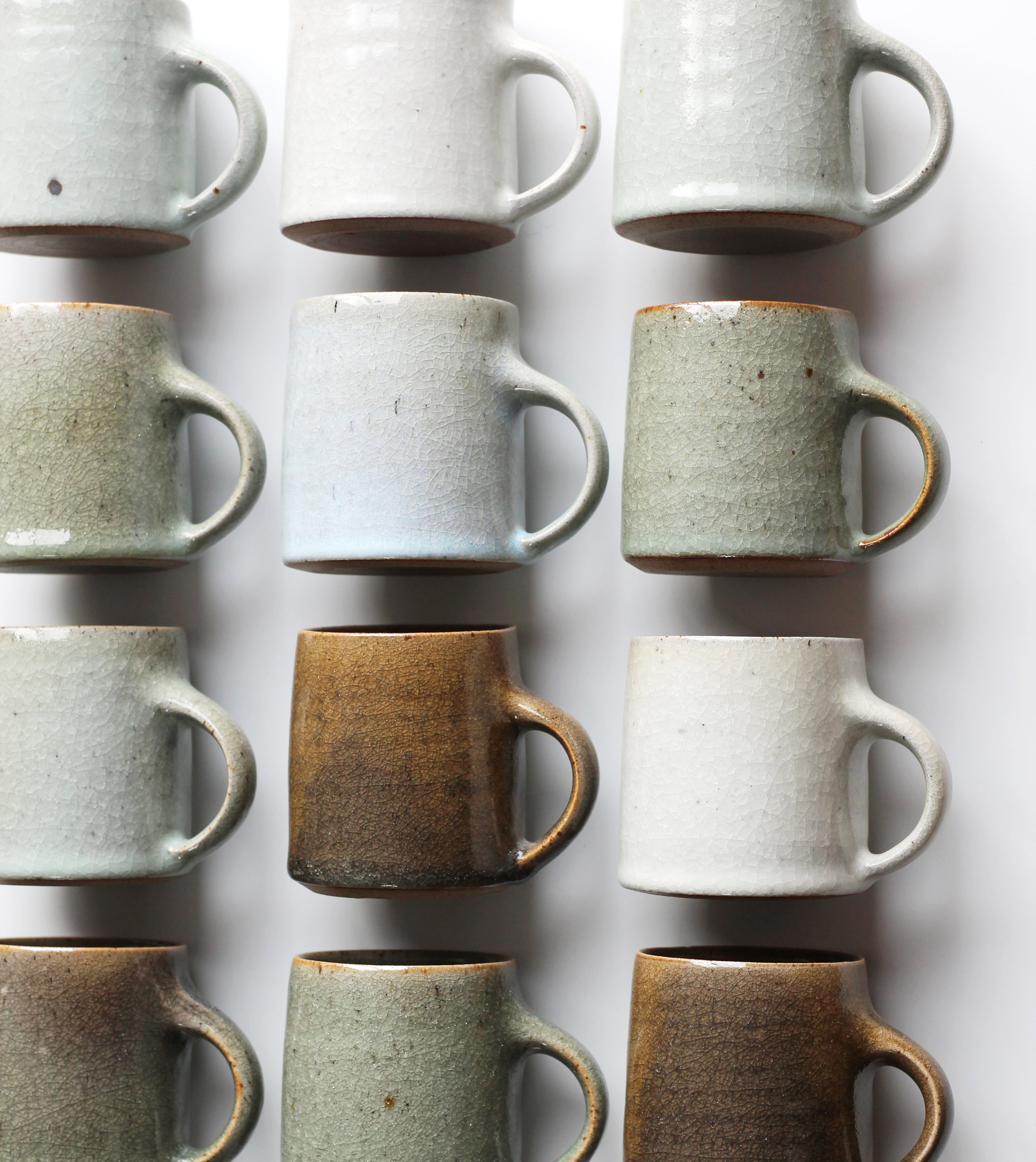 Multiple ceramic mugs.